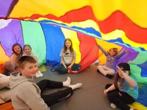 Kids In Motion - Parachute play